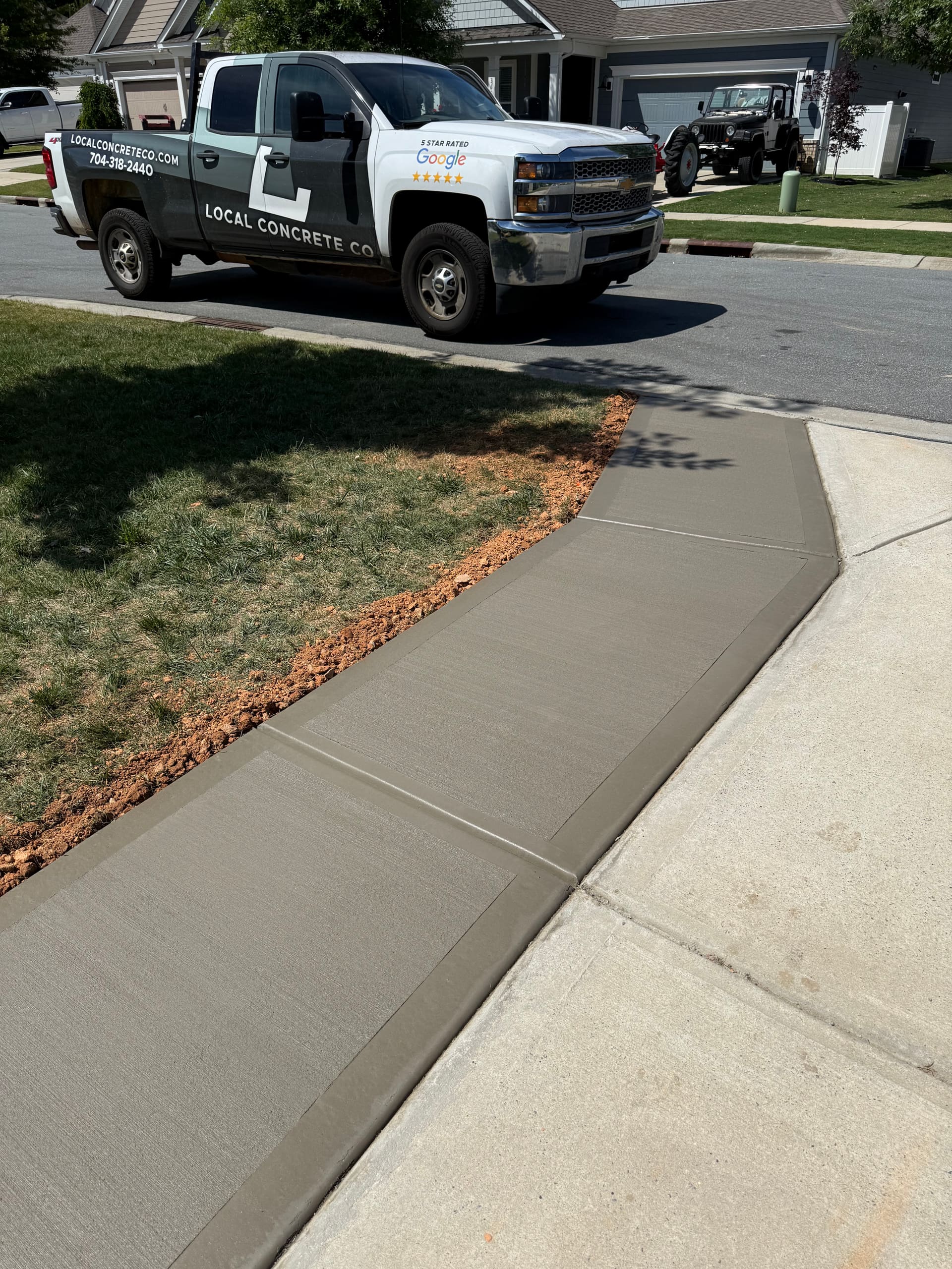 Latest project: 3-car residential driveway, broom finish with sawcut control joints